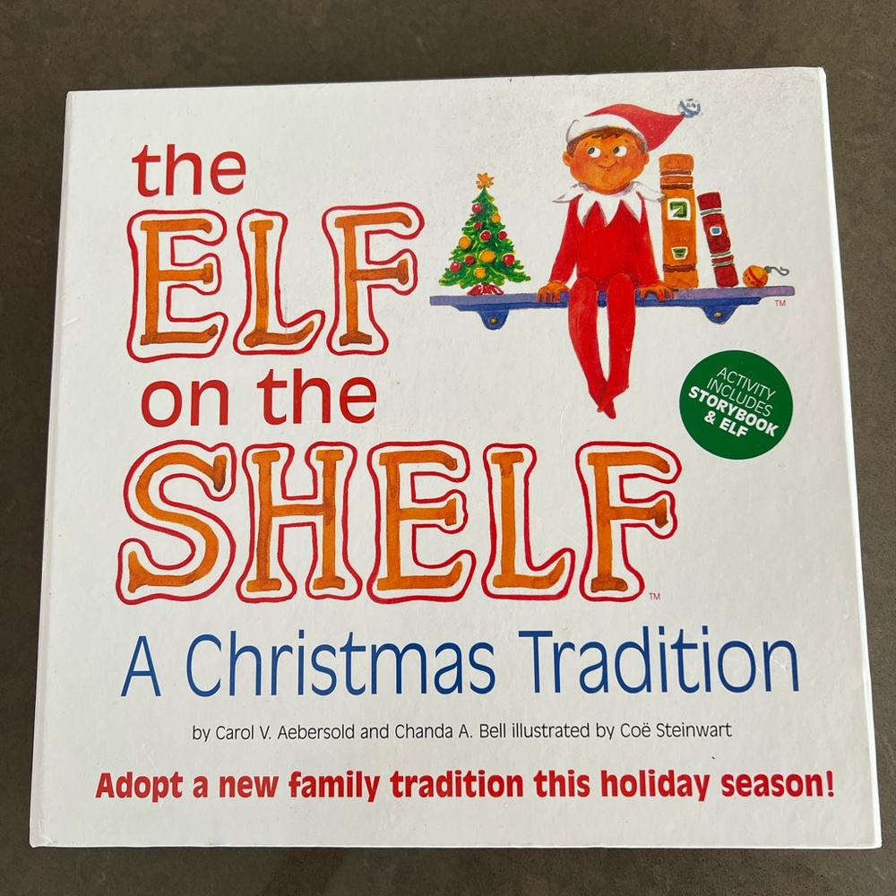 Elf on a Shelf : elf and storybook.